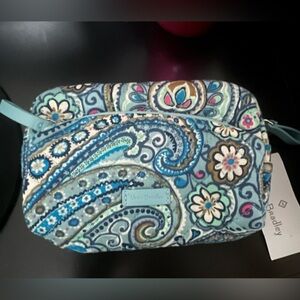 NWT Vera Bradley plastic-lined small case with 1 large zipper exterior pocket.